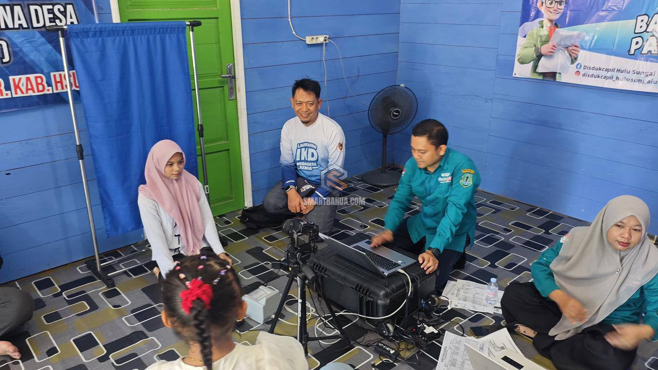 BAILANG PAKACIL Tembus Rawa Paminggir, PastikanLayanan Adminduk hingga Pelosok